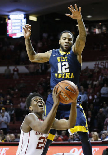 Slideshow: No. 13 WVU holds on against Oklahoma
